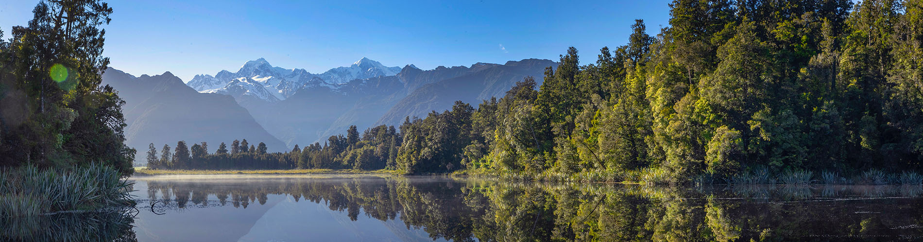 New Zealand alpine landscape reflected on water